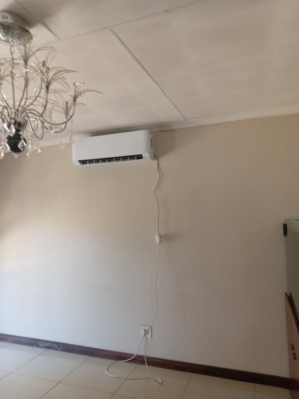 Split air conditioning unit installed in lounge area