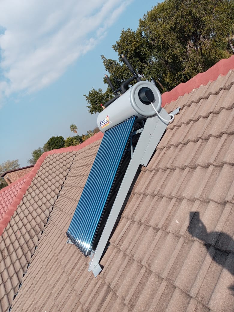 Apollo solar geyser with evacuated tubes installed on tiled roof